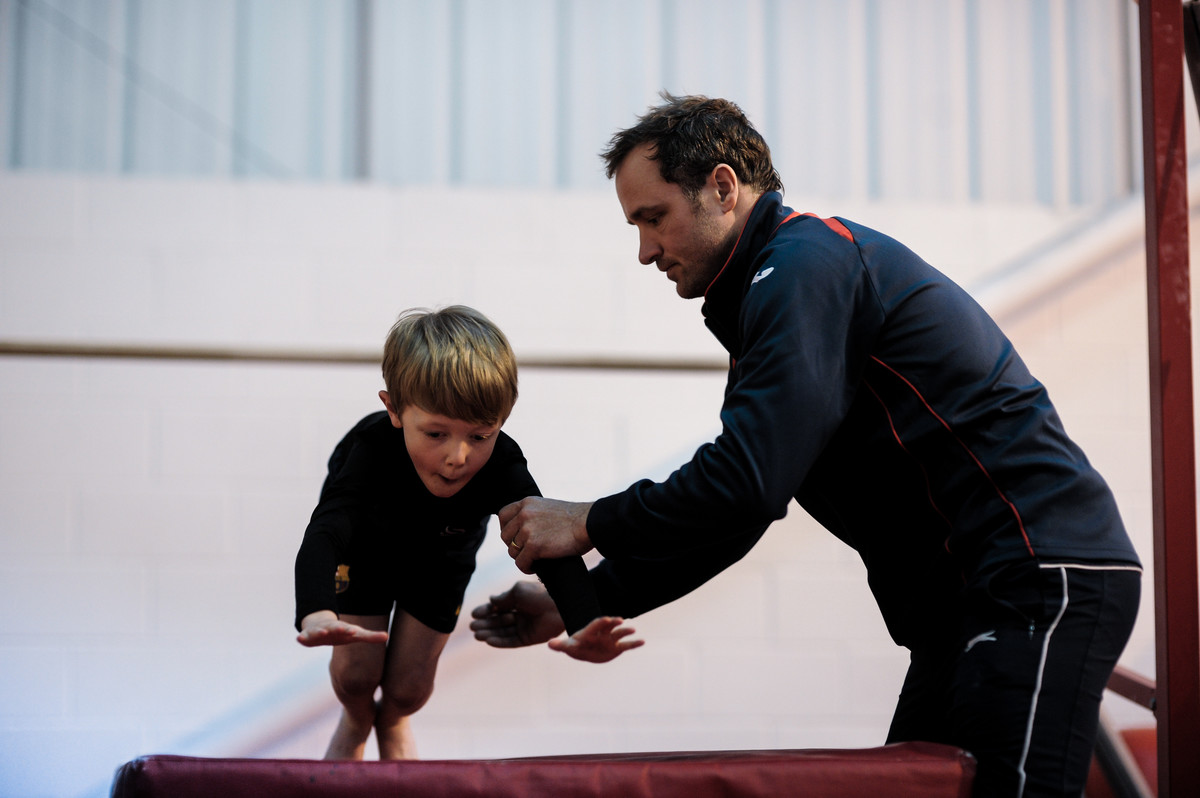 Coaching makes the difference as young gymnast tries out new skills