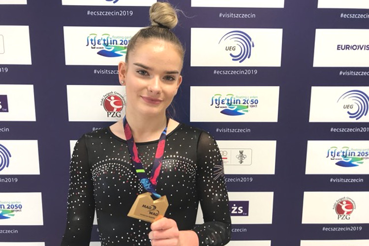 Alice Kinsella wins brilliant beam gold 